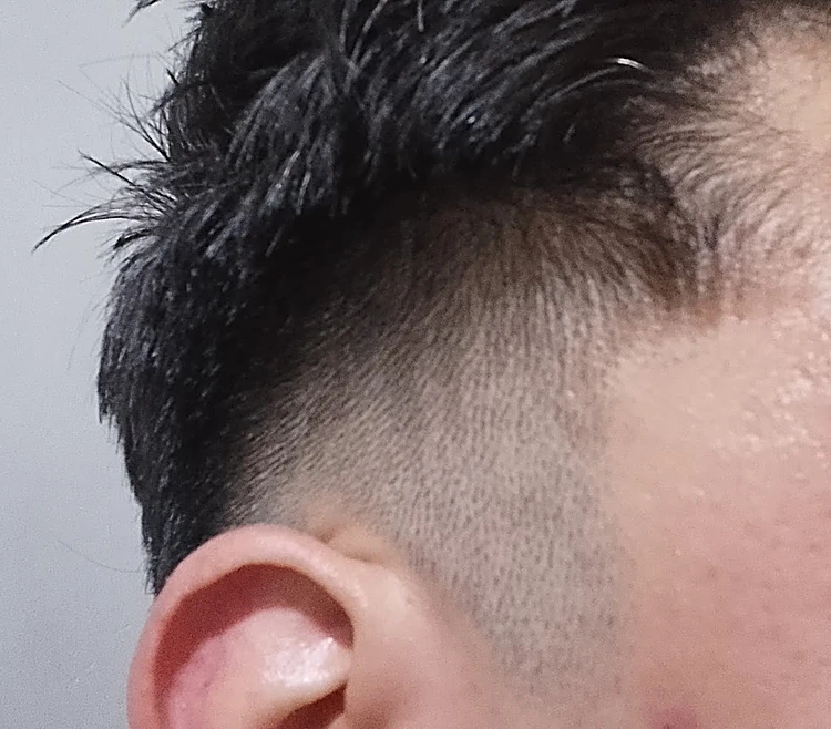 Detalle de un degradado limpio alrededor de la oreja